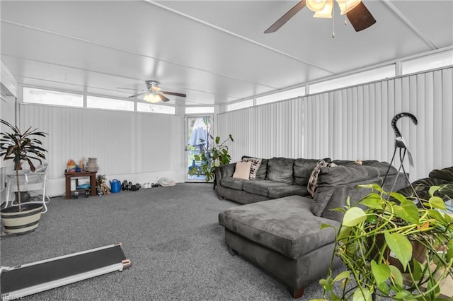 carpeted living room with ceiling fan