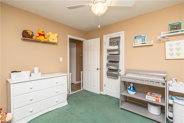 carpeted bedroom with ceiling fan