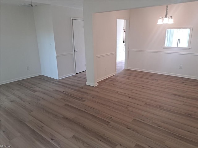 5541 Old Guard Cres, Virginia Beach, VA 23462 - spare room featuring baseboards and wood finished floors