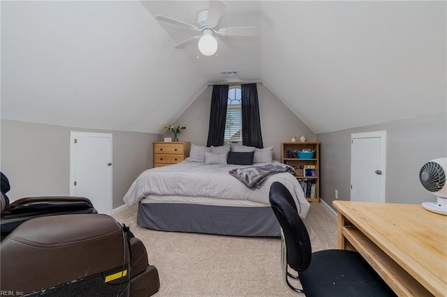 bedroom with ceiling fan, carpet flooring, visible vents, and lofted ceiling
