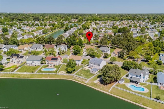 aerial view featuring a water view and a residential view