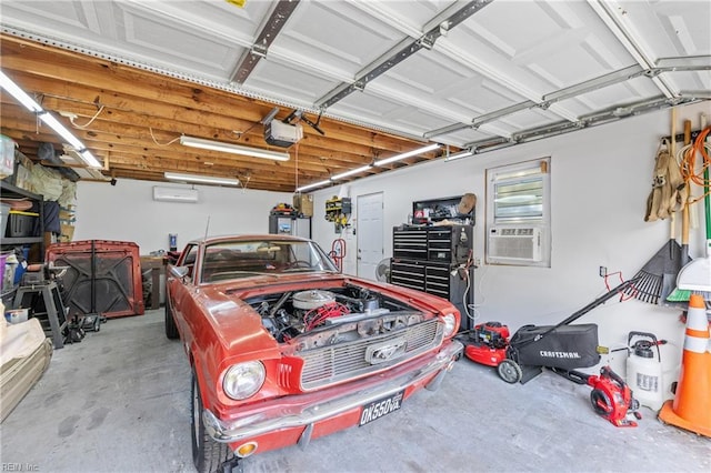 garage with a garage door opener and cooling unit