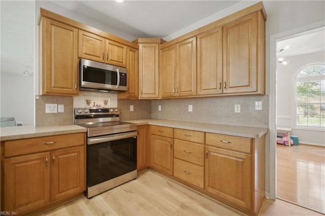 408 Leffler Ln, Virginia Beach, VA 23452 - kitchen featuring light countertops, appliances with stainless steel finishes, and light wood-style floors