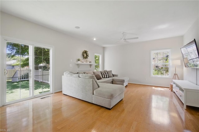 408 Leffler Ln, Virginia Beach, VA 23452 - living area with light wood-style flooring, ceiling fan, a wealth of natural light, and visible vents