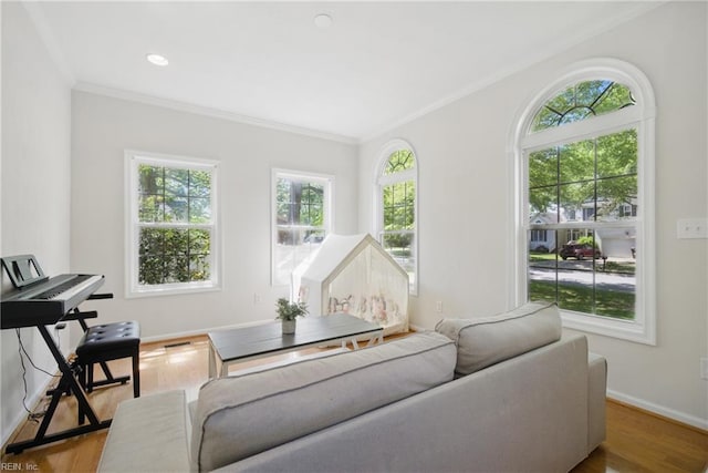 408 Leffler Ln, Virginia Beach, VA 23452 - living room featuring baseboards, wood finished floors, a wealth of natural light, and crown molding
