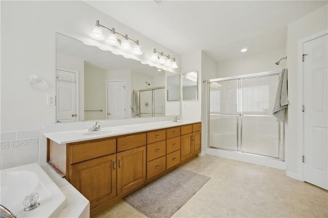 408 Leffler Ln, Virginia Beach, VA 23452 - bathroom with double vanity, a shower stall, a bath, and a sink