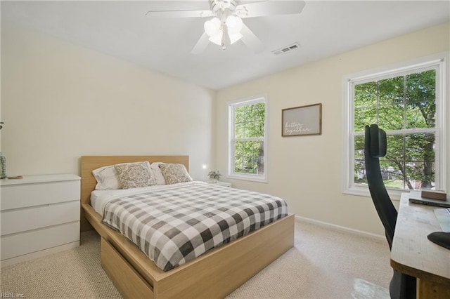 408 Leffler Ln, Virginia Beach, VA 23452 - bedroom with baseboards, visible vents, a ceiling fan, and light carpet