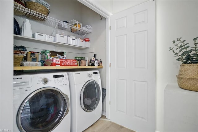 408 Leffler Ln, Virginia Beach, VA 23452 - laundry room featuring separate washer and dryer, a bar, laundry area, and light wood-type flooring