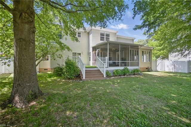 408 Leffler Ln, Virginia Beach, VA 23452 - back of house with a sunroom, crawl space, a yard, ceiling fan, and fence
