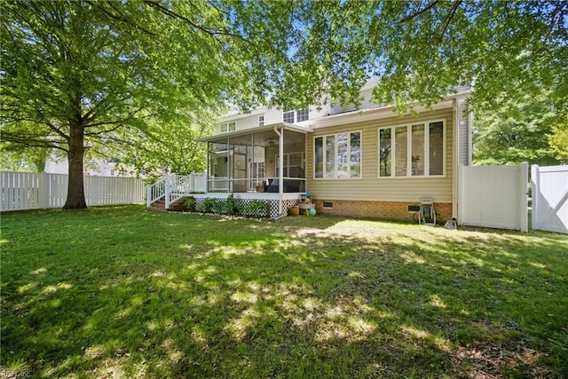 408 Leffler Ln, Virginia Beach, VA 23452 - back of property featuring a gate, a fenced backyard, a yard, and a sunroom