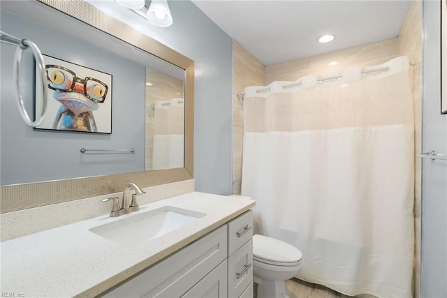 full bath with toilet, recessed lighting, shower / bath combination with curtain, and vanity