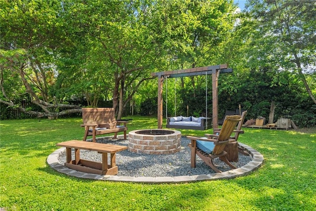 view of yard with an outdoor fire pit