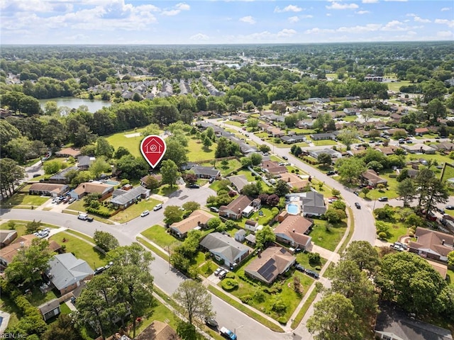 bird's eye view with a residential view and a water view