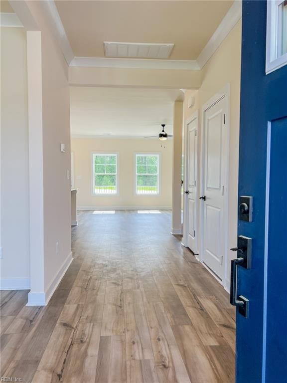 152 Mcpherson Rd, South Mills, NC 27976 - hallway featuring baseboards, visible vents, wood finished floors, and crown molding