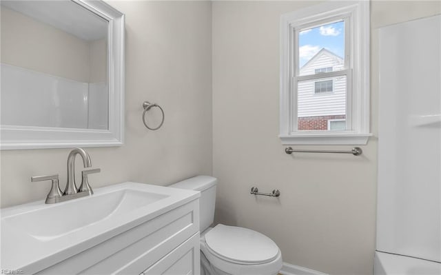 9254 Marlow Ave, Norfolk, VA 23503 - bathroom with vanity, baseboards, walk in shower, and toilet