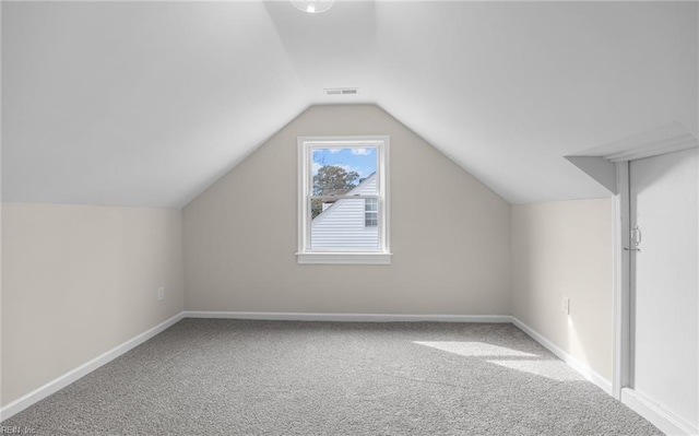 9254 Marlow Ave, Norfolk, VA 23503 - additional living space featuring baseboards, visible vents, carpet flooring, and lofted ceiling