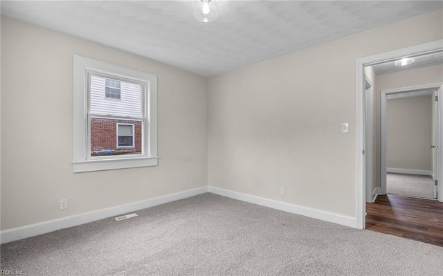 9254 Marlow Ave, Norfolk, VA 23503 - unfurnished room featuring baseboards, carpet, and visible vents