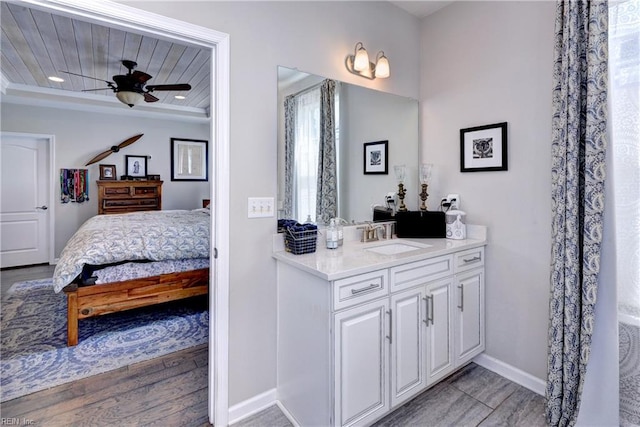 full bath featuring ceiling fan, vanity, ensuite bath, baseboards, and wooden ceiling