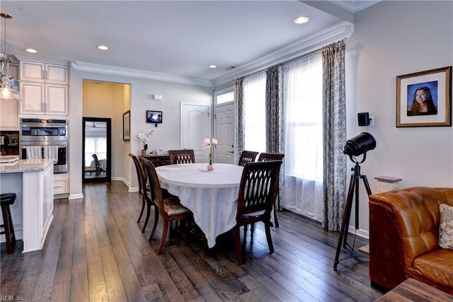 dining space featuring recessed lighting, baseboards, ornamental molding, and dark wood-style floors