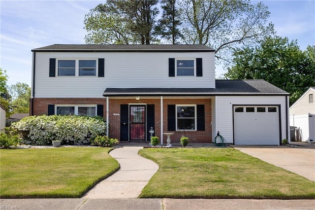110 Greenwell Dr, Hampton, VA 23666 - traditional-style home with a garage, a front lawn, covered porch, brick siding, and driveway