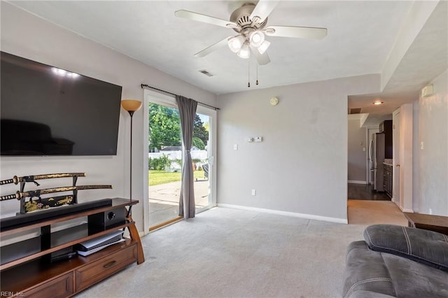 110 Greenwell Dr, Hampton, VA 23666 - living room with baseboards, ceiling fan, light carpet, and visible vents