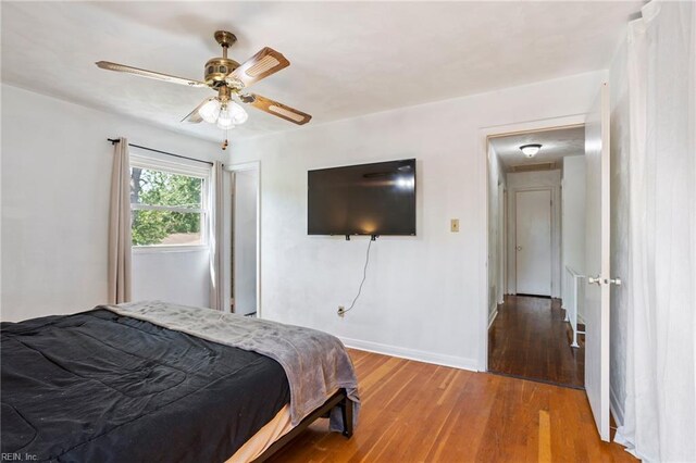 110 Greenwell Dr, Hampton, VA 23666 - bedroom with baseboards, a ceiling fan, and wood finished floors