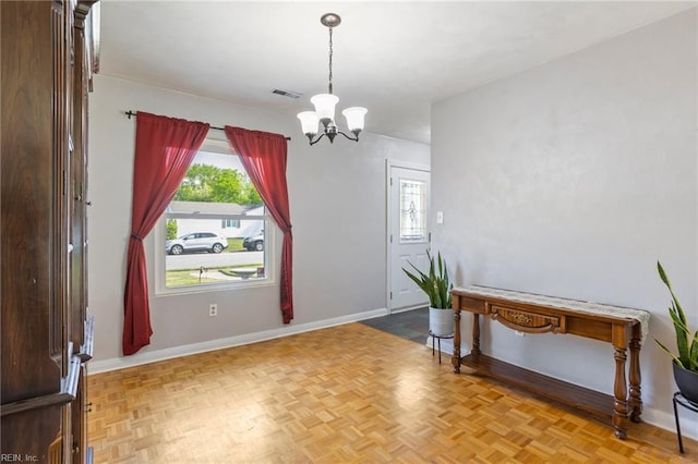 110 Greenwell Dr, Hampton, VA 23666 - foyer entrance featuring baseboards, a notable chandelier, and visible vents