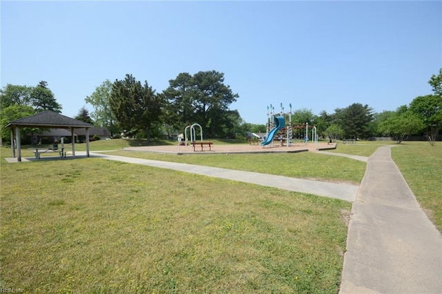communal playground with a gazebo and a lawn