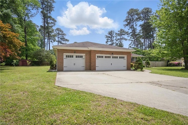 garage with fence and driveway