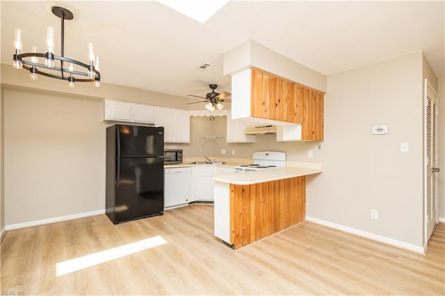 1103 Black Duck Ct, Virginia Beach, VA 23451 - kitchen featuring freestanding refrigerator, light wood-style floors, stove, under cabinet range hood, and a sink
