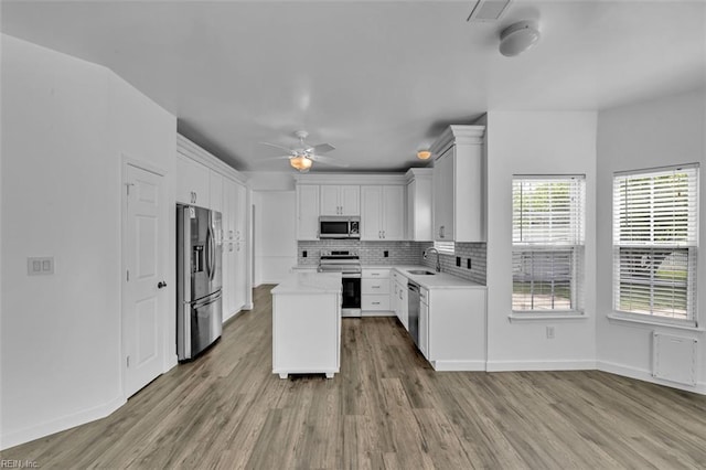 157 Pier Lndg, South Mills, NC 27976 - kitchen with ceiling fan, a sink, stainless steel appliances, wood finished floors, and visible vents
