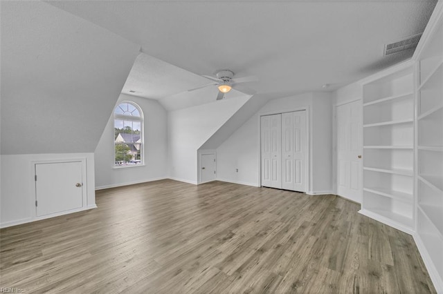157 Pier Lndg, South Mills, NC 27976 - bonus room featuring a ceiling fan, visible vents, wood finished floors, and lofted ceiling