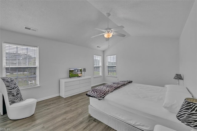 157 Pier Lndg, South Mills, NC 27976 - bedroom featuring baseboards, visible vents, a textured ceiling, and wood finished floors