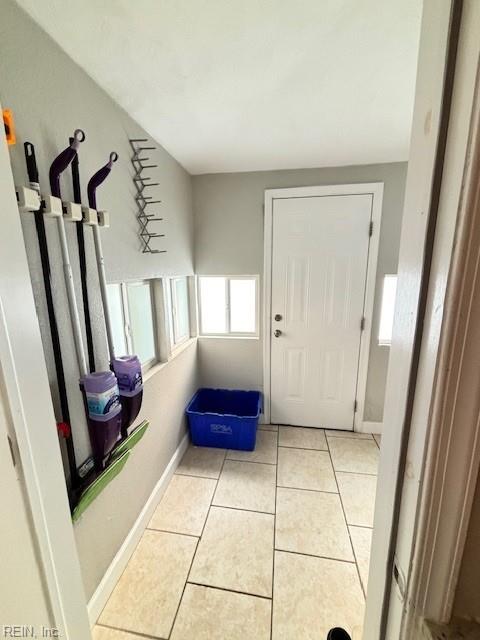 639 Mt Vernon Ave, Portsmouth, VA 23707 - doorway to outside featuring tile patterned flooring and baseboards