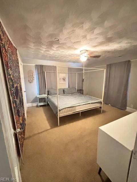 639 Mt Vernon Ave, Portsmouth, VA 23707 - carpeted bedroom featuring a ceiling fan and baseboards