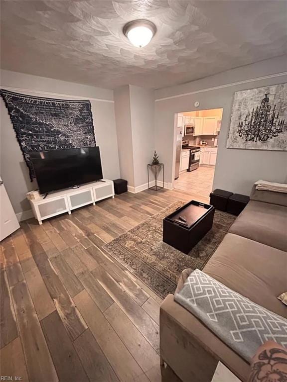639 Mt Vernon Ave, Portsmouth, VA 23707 - living area featuring baseboards and wood finished floors