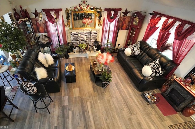 820 Pine Tree Ct, Newport News, VA 23608 - living room with a fireplace with raised hearth and wood finished floors
