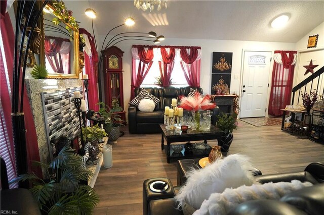 820 Pine Tree Ct, Newport News, VA 23608 - living room featuring vaulted ceiling and wood finished floors