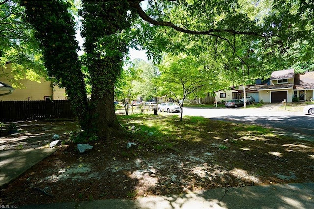 820 Pine Tree Ct, Newport News, VA 23608 - view of yard featuring fence and a garage