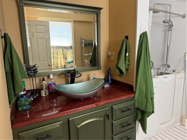 full bathroom featuring vanity and curtained shower