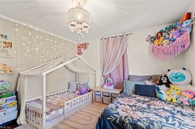 bedroom featuring a notable chandelier