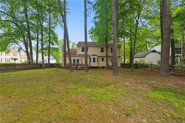 2 Sarfan Dr, Hampton, VA 23664 - back of house with a yard and a fenced backyard