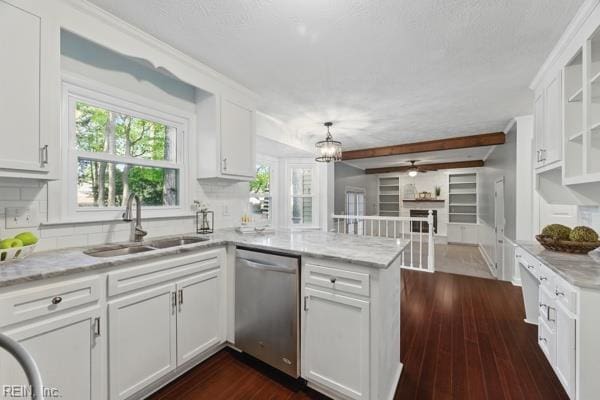 2 Sarfan Dr, Hampton, VA 23664 - kitchen with a sink, a peninsula, white cabinetry, and dishwasher