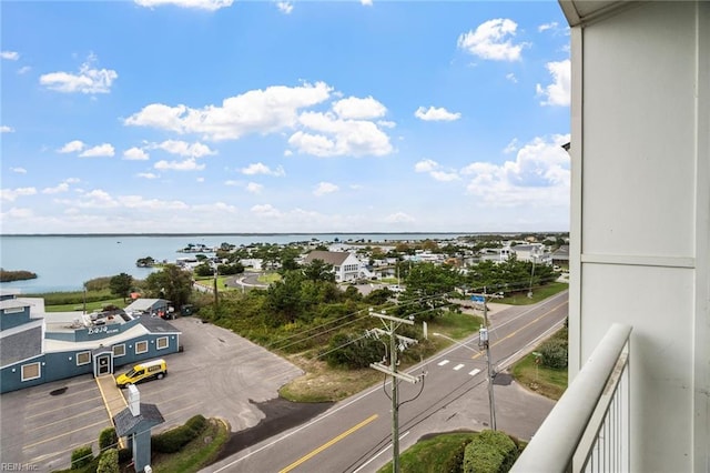 balcony featuring a water view