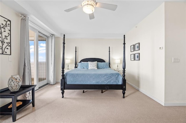 carpeted bedroom featuring baseboards, access to outside, and a ceiling fan