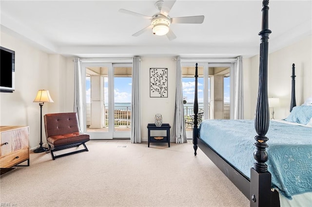 carpeted bedroom featuring access to outside and ceiling fan