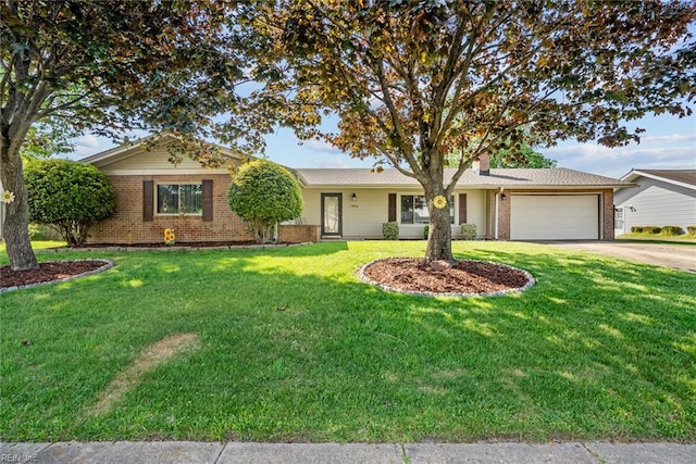 ranch-style home with a garage, a front yard, driveway, and brick siding