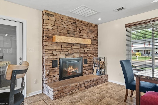 office with baseboards, a fireplace, recessed lighting, and visible vents