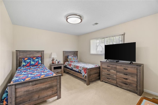bedroom with carpet flooring and visible vents