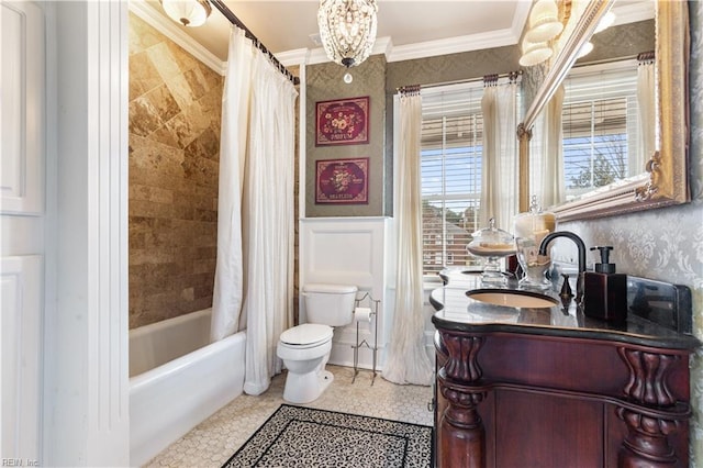full bathroom featuring vanity, ornamental molding, toilet, a chandelier, and shower / tub combo